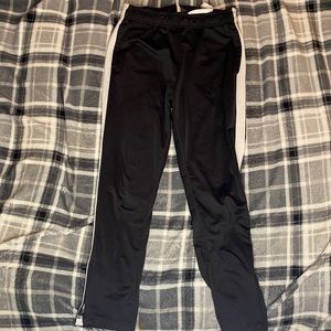 Large black with white strips pants